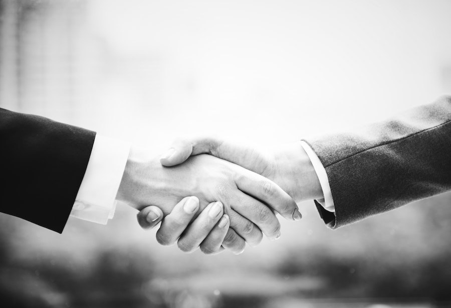handshake deal to convert customers